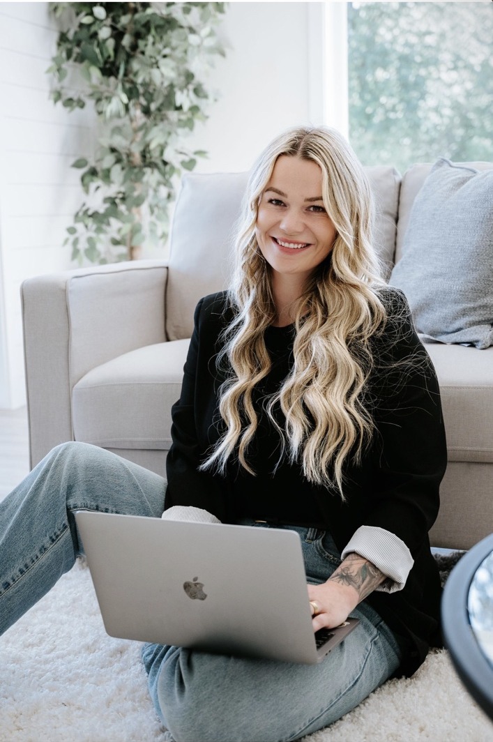Aubrey Davenport working on her laptop at home